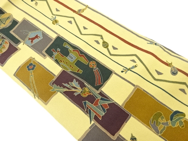 縮緬地　金彩　野菜・玩具模様名古屋帯